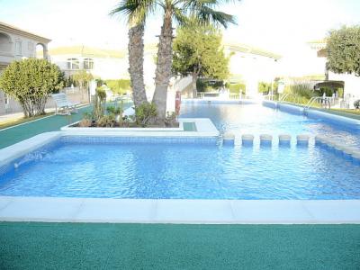 Lovely 2 bed ground floor apartment with stunning pool 15 mins walk sandy beach & near all ameni